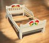 Bővíthető  gyerekágy fából, törtfehér színben, 2-2 gomba  süni dísszel, 80x140-180 cm